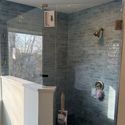 Blue glass tile shower
