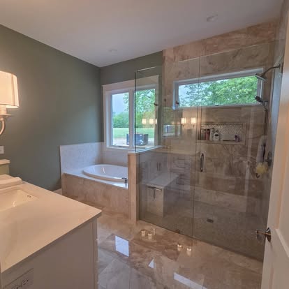 Travertine master bathroom